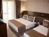 Трёхместный номер Стандарт с балконом