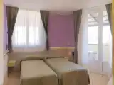 Четырёхместный номер Стандарт с балконом