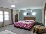 Трёхместный номер Deluxe