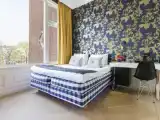Четырёхместный номер Deluxe с балконом и с видом на канал