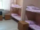 Спальное место на двухъярусной кровати в общем номере для мужчин