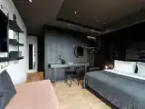 Трёхместный номер Deluxe с балконом