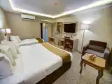 Трёхместный номер Deluxe
