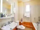 Четырёхместный номер Стандарт с балконом и с видом на сад