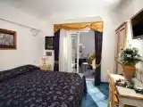 Четырёхместный номер Стандарт с балконом и с видом на море