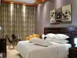Трёхместный номер Deluxe