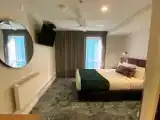Трёхместный номер Deluxe