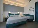 Трёхместный номер Стандарт с балконом