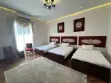 Трёхместный номер Deluxe