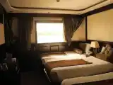 Трёхместный номер Deluxe с 2 комнатами с балконом и с видом на сад