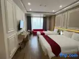 Трёхместный номер Deluxe