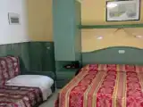 Трёхместный номер Стандарт с балконом