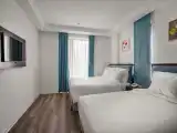 Трёхместный номер Deluxe