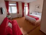 Трёхместный номер Deluxe