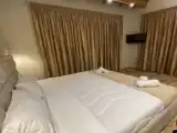 Трёхместный номер Deluxe с балконом и с видом на море