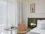 Четырёхместный семейный номер Стандарт с видом на бассейн
