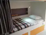 Кровать в общем номере