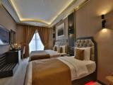 Трёхместный номер Deluxe