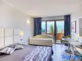 Трёхместный номер Deluxe