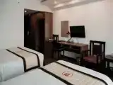 Трёхместный номер Deluxe с балконом и с видом на город