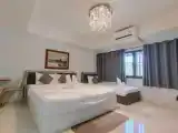 Трёхместный номер Deluxe
