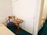 Четырёхместный номер Стандарт с балконом