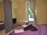 Четырёхместный номер Стандарт с балконом