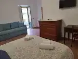 Четырёхместный номер Стандарт с балконом