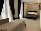 Трёхместный номер Стандарт с балконом и с частичным видом на море
