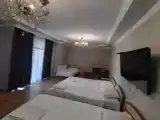 Четырёхместный номер Стандарт с балконом