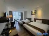 Семейный номер Deluxe с частичным видом на море