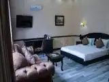 Трёхместный номер Deluxe
