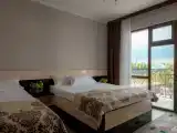 Трёхместный люкс с балконом