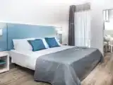 Трёхместный номер Deluxe с балконом
