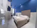 Трёхместный номер Deluxe с видом на город