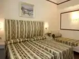 Трёхместный номер Стандарт с балконом