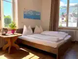 Четырёхместный номер Стандарт с балконом и с красивым видом из окна