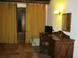 Четырёхместный номер Стандарт Цокольный этаж c 1 комнатой
