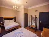 Четырёхместный номер Стандарт с балконом