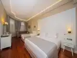 Трёхместный номер Deluxe