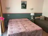 Трёхместный номер Стандарт с балконом