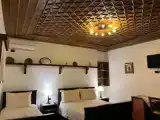 Четырёхместный номер Стандарт Цокольный этаж с балконом