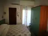 Трёхместный номер Стандарт с балконом и с видом на сад