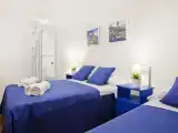 Трёхместный номер Deluxe