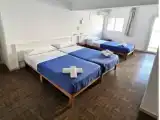 Трёхместный номер Deluxe с балконом