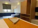Трёхместный номер Deluxe