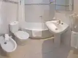 Четырёхместный номер Стандарт с балконом