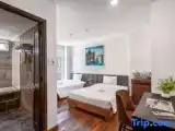 Трёхместный номер Deluxe