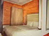 Двухместный коттедж