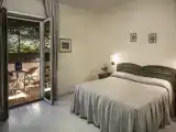 Трёхместный номер Стандарт с балконом